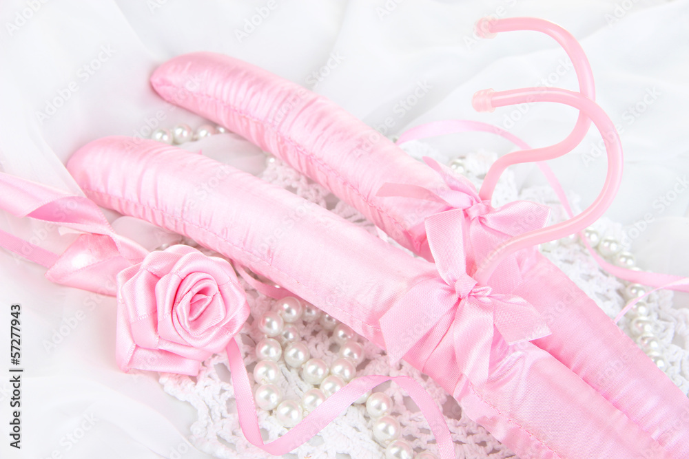 Beautiful hanger on fabric background Beautiful hanger on fabric background