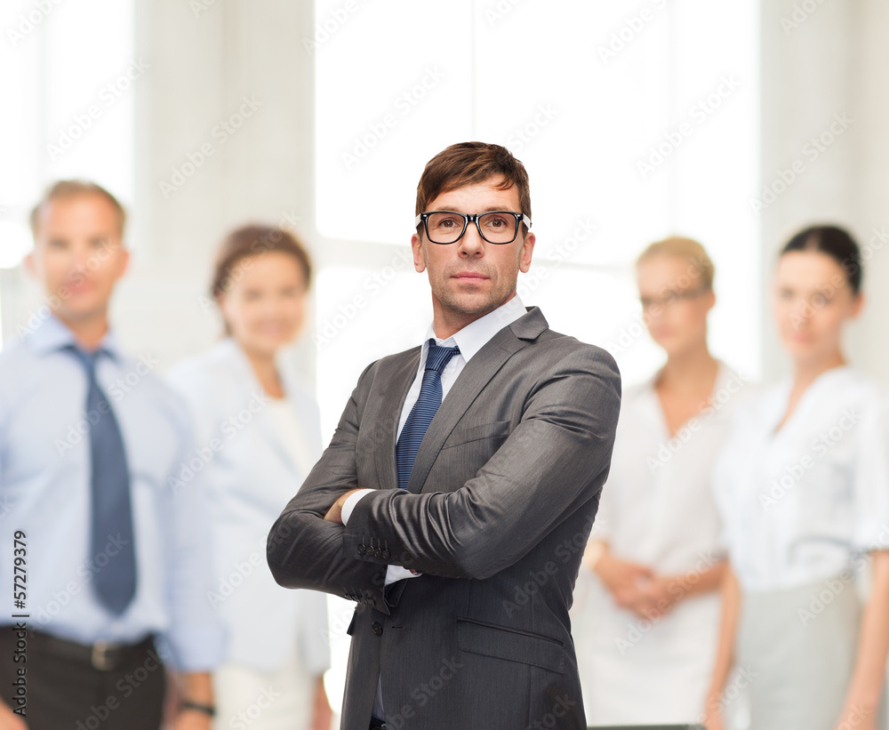 attractive buisnessman or teacher in glasses