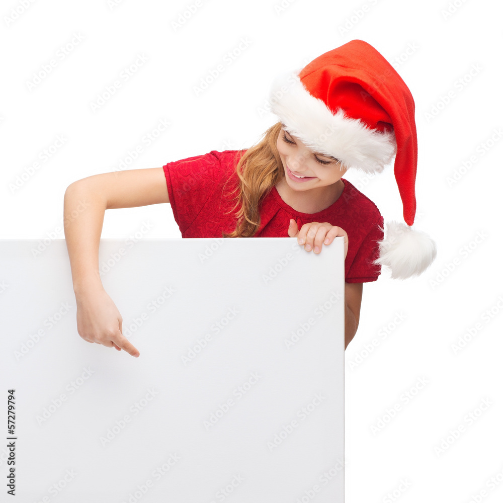 woman in santa helper hat with blank white board