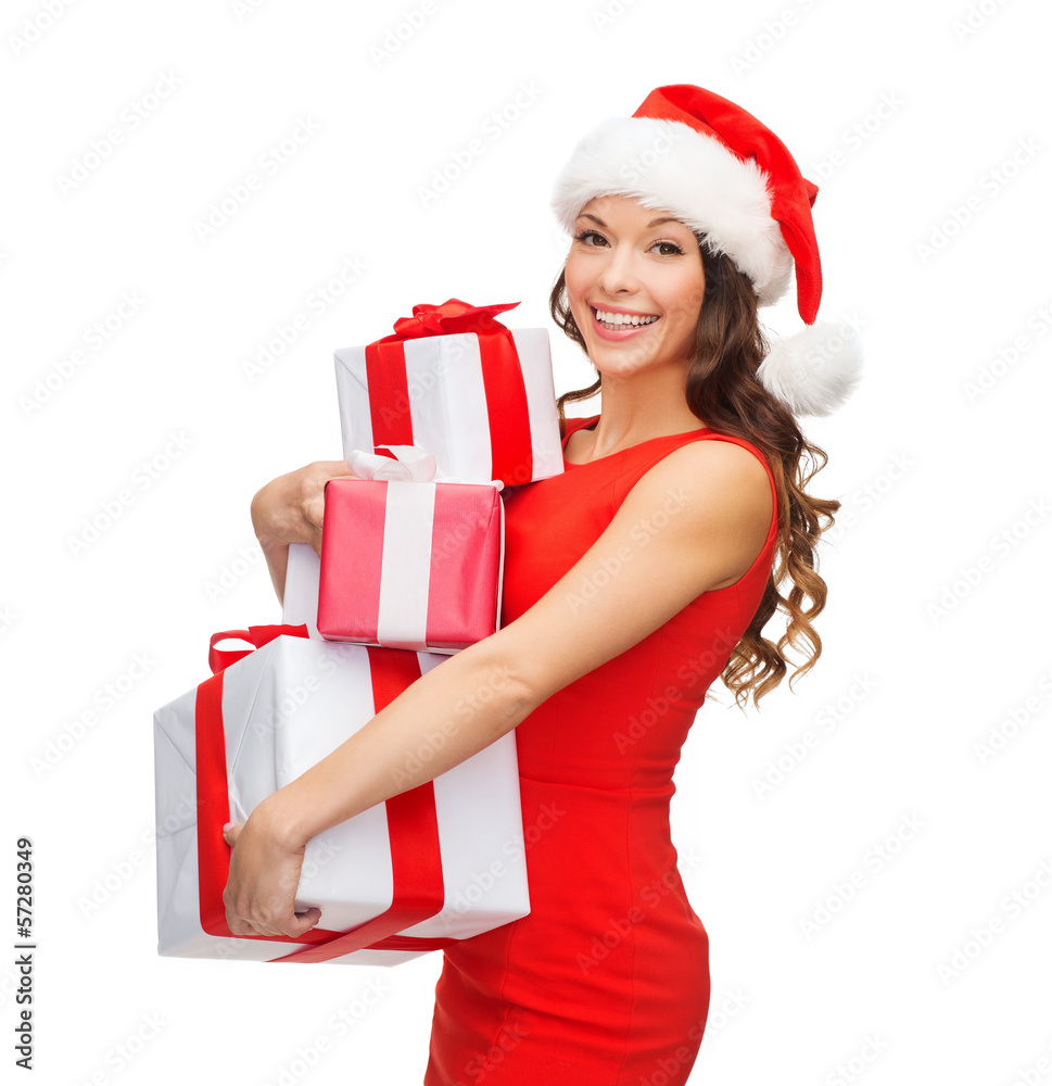smiling woman in red dress with many gift boxes smiling woman in red dress with many gift boxes
