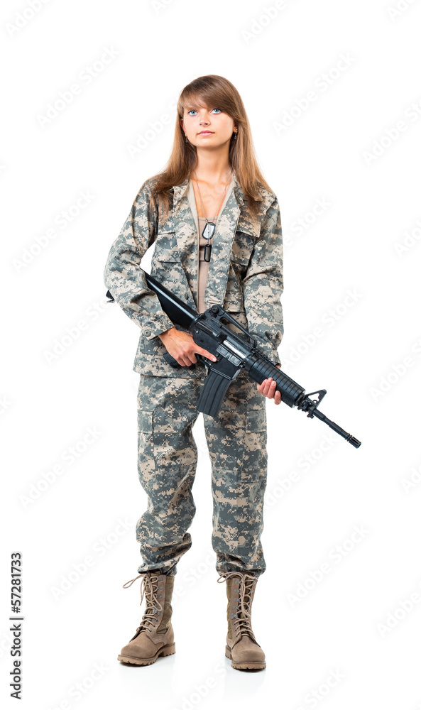 Soldier young beautyful girl dressed in a camouflage with a gun Soldier young beautyful girl dressed in a camouflage with a gun