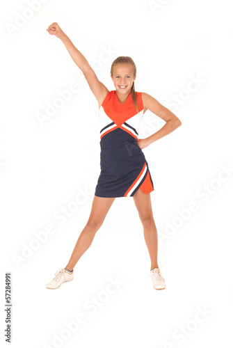 Young high school cheerleader cheering with no pom poms one hand