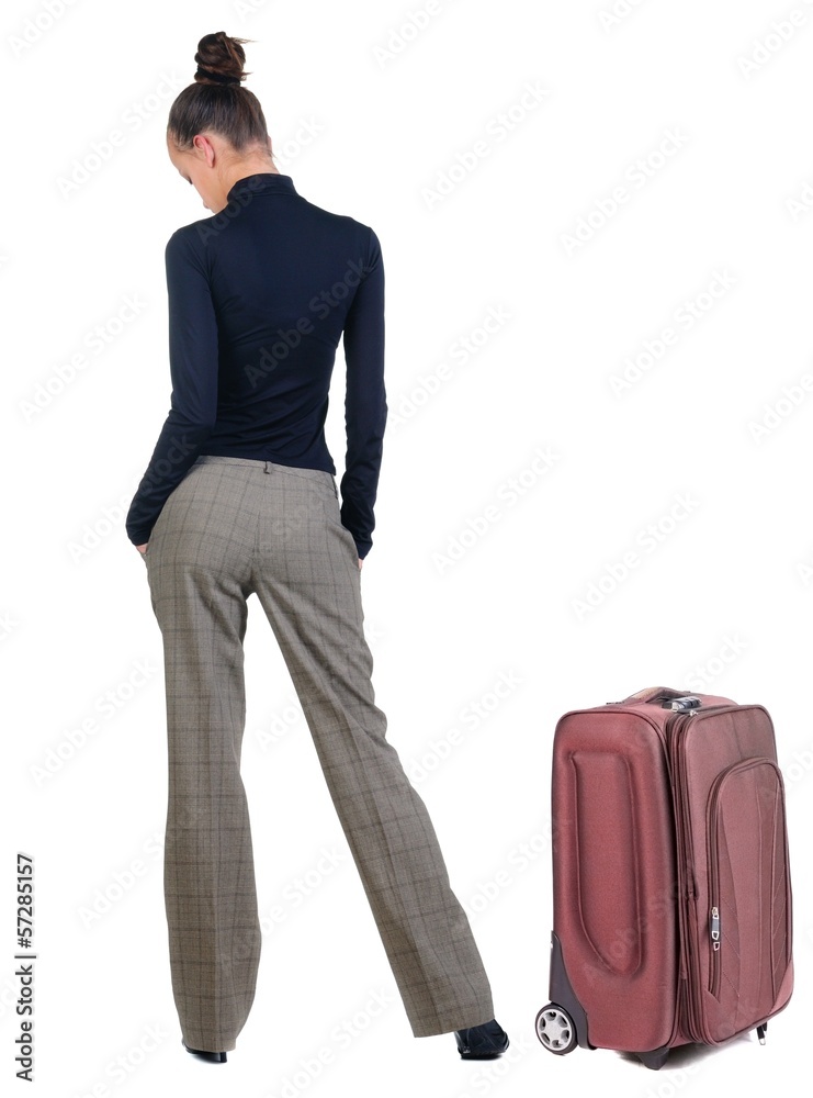 traveling sad young woman with suitcas . traveling sad young woman with suitcas .