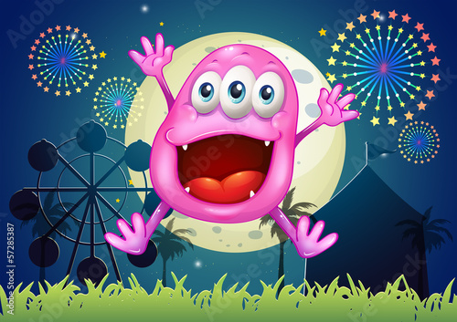 An amusement park with a very happy beanie monster