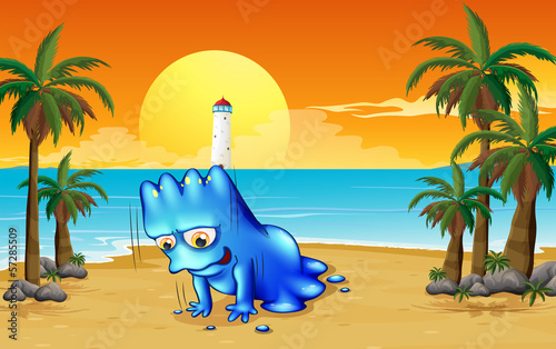 A beach with a blue monster