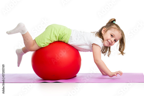 Kid having fun with  gymnas...