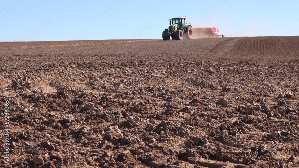 Agriculture tractor with machine sowing seeds Agriculture tractor with machine sowing seeds