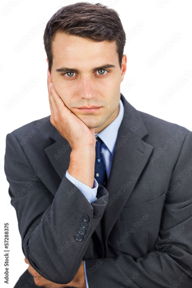 Concentrated businessman looking at camera Concentrated businessman looking at camera