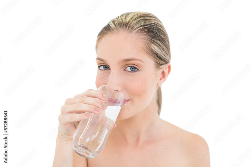 Lovely fresh blonde woman drinking water Lovely fresh blonde woman drinking water