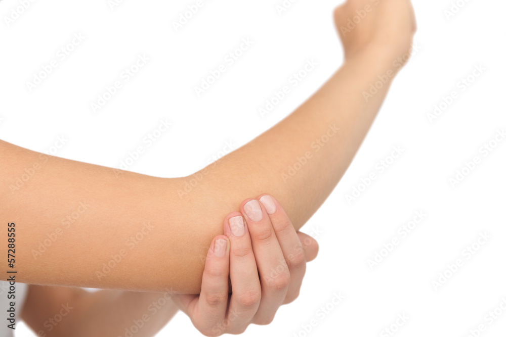 Close up of young woman with a sore elbow