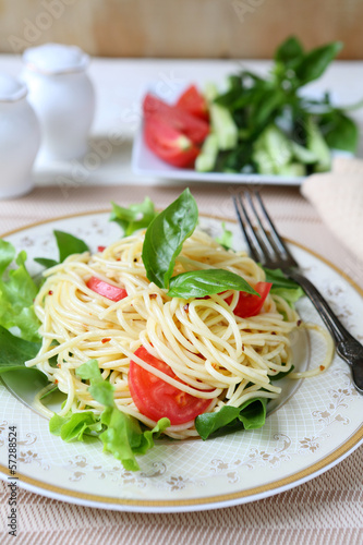 delicious spaghetti with tomato and basil