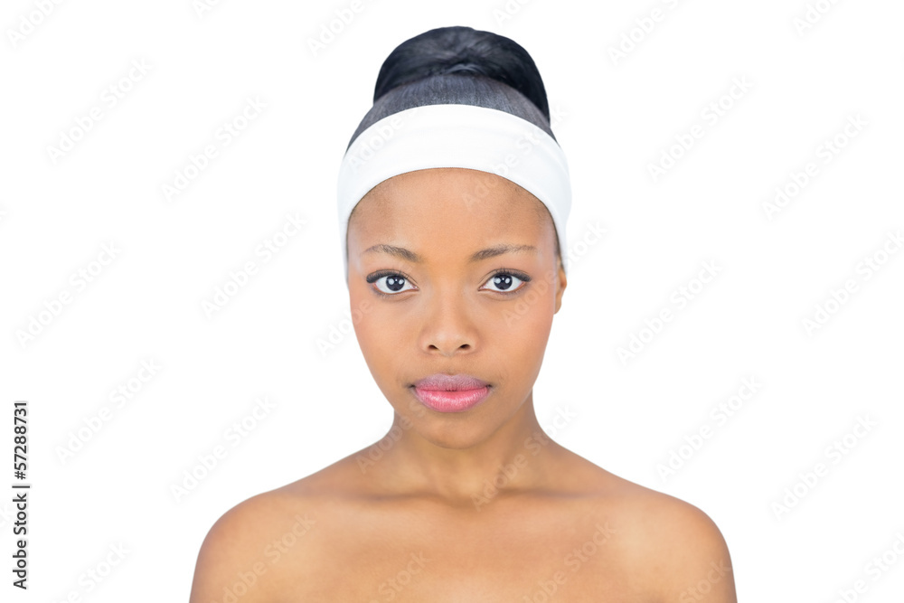Unsmiling woman looking at camera Unsmiling woman looking at camera