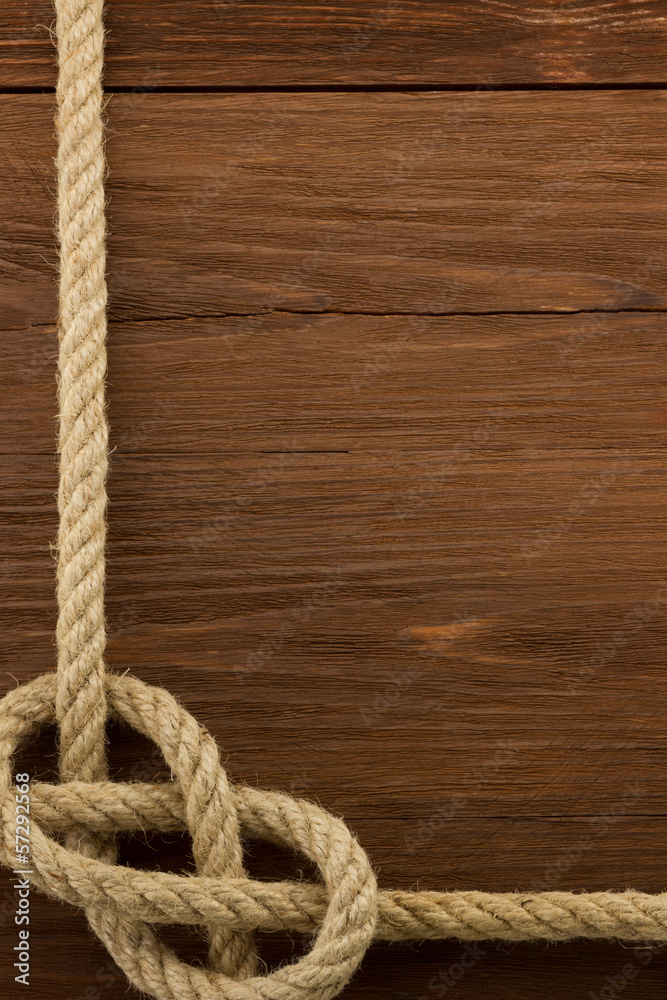 Fototapeta premium ship ropes on wood