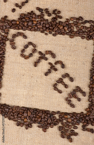 "Coffee" word made of coffee beans with a frame of beans