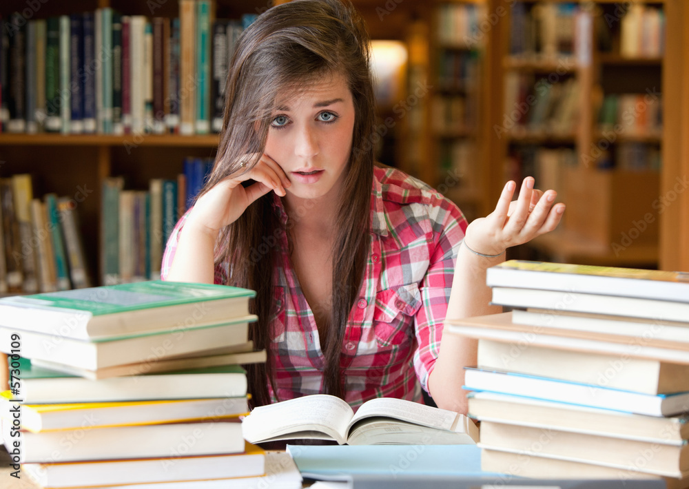 Disappointed student having a lot to read Disappointed student having a lot to read