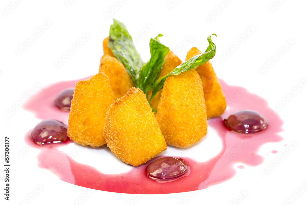 grilled cheese with berry sauce on a white background grilled cheese with berry sauce on a white background