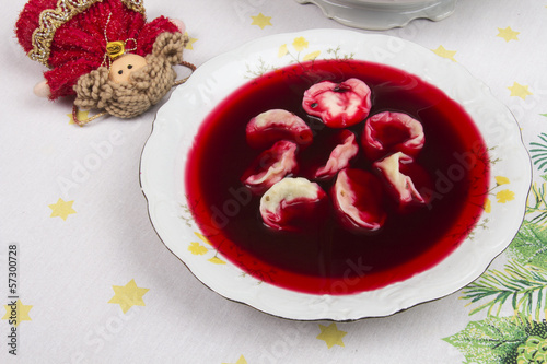 Red borsch with uszka, traditional Christmas Eve dish photo