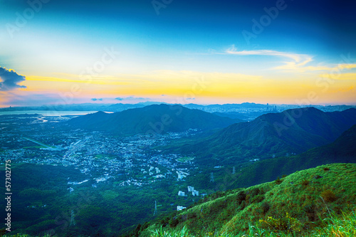 hong kong sunrise on mountain © Cozyta