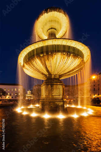Fountain in the Geschwister-Scholl-Platz in the evening. Munich,