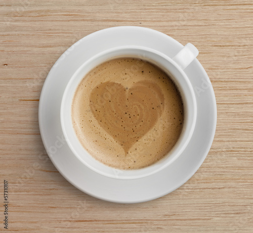 coffee cup with heart shape on foam