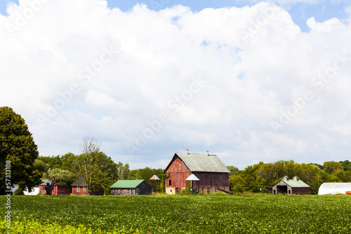 American Farmland With Blue Cloudy Sky