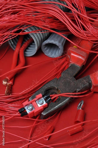 Electrical components and tools in the current colors of red-hot