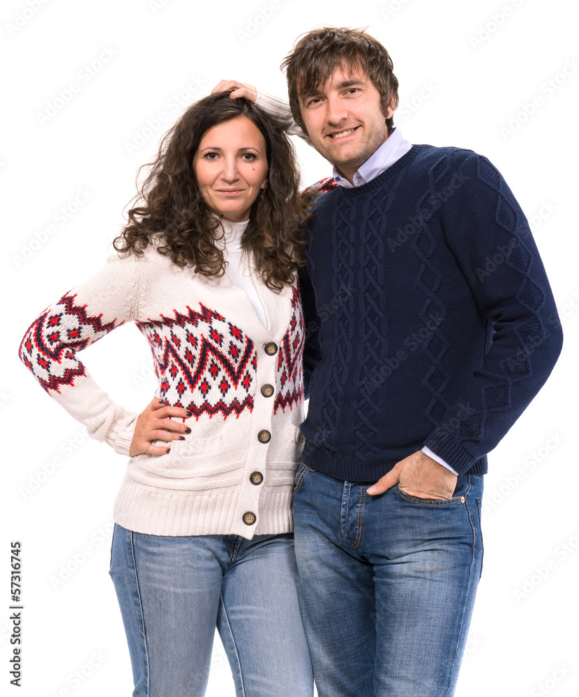 Smiling family couple in sweaters Smiling family couple in sweaters