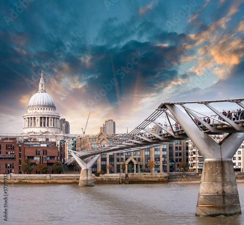 Photography London, UK. Wonderful side view of Millennium Bridge at sunset,