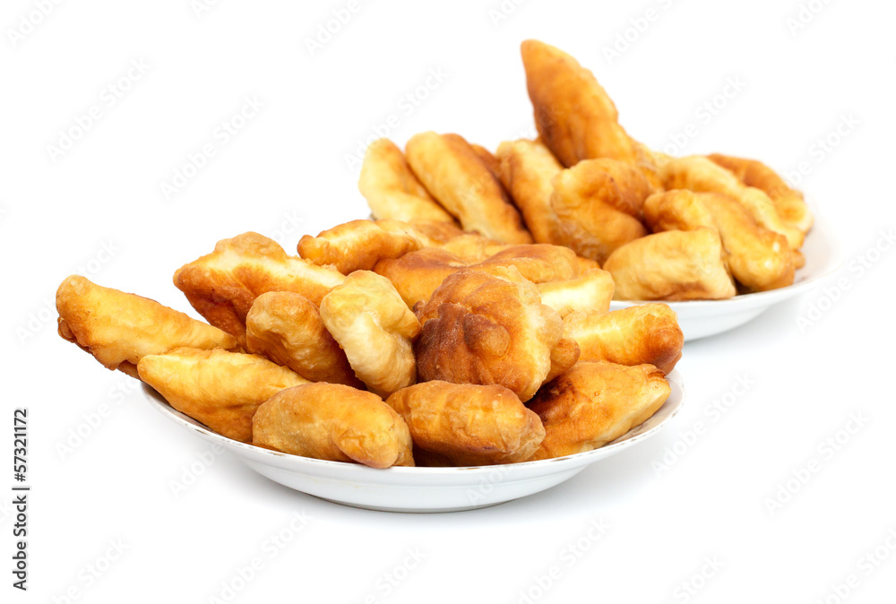 Russian patties in the plate on white background Russian patties in the plate on white background
