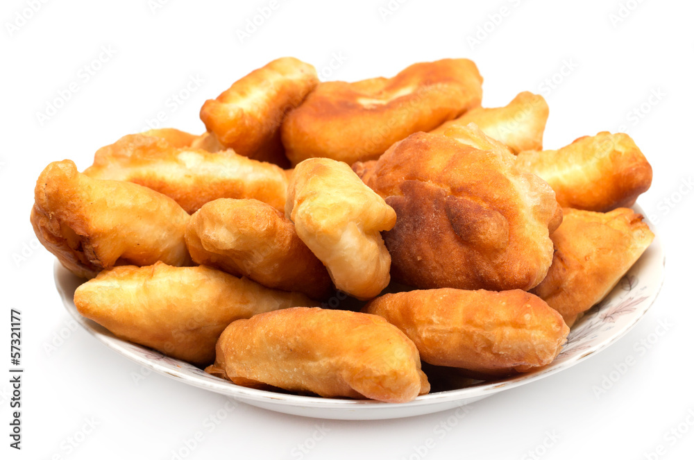 Russian patties in the plate on white background Russian patties in the plate on white background