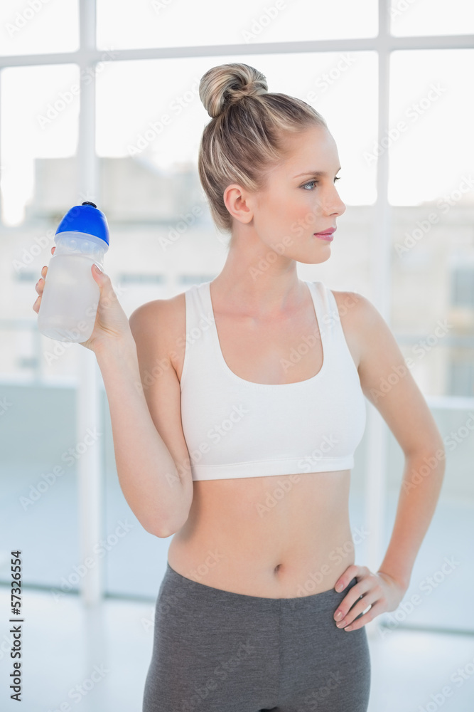 Peaceful sporty blonde holding flask Peaceful sporty blonde holding flask