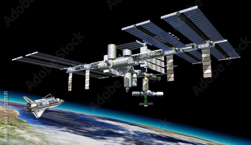 Fototapeta Naklejka Na Ścianę i Meble -  Space station in orbit around Earth, with Shuttle.