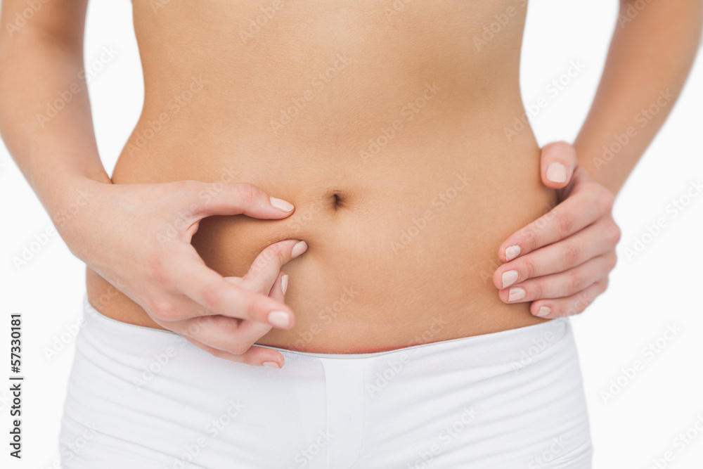 Young woman without any fat on her belly Young woman without any fat on her belly