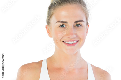Attractive smiling blonde looking at camera