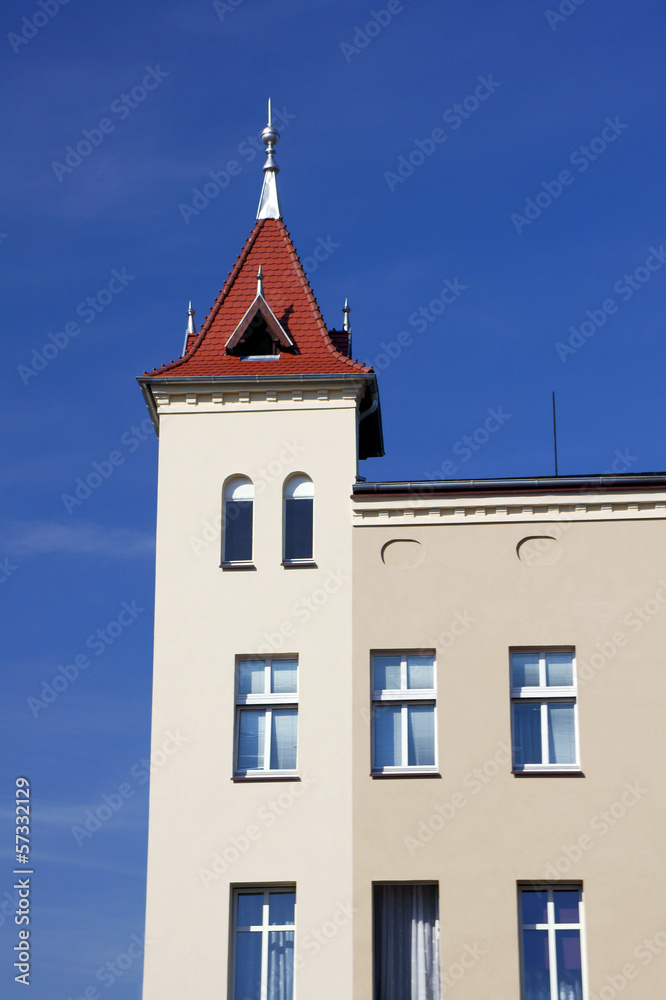 The building with a tower in Ostrzeszow, Poland. The building with a tower in Ostrzeszow, Poland.