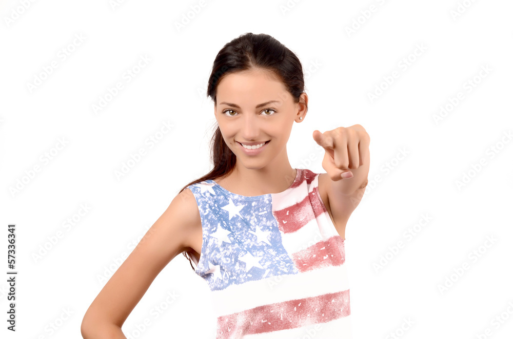 Beautiful American girl pointing in front to you.Focus on model. Beautiful American girl pointing in front to you.Focus on model.