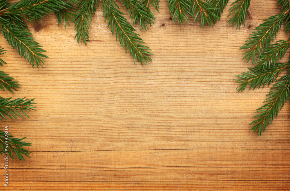 wooden background with Christmas tree border wooden background with Christmas tree border