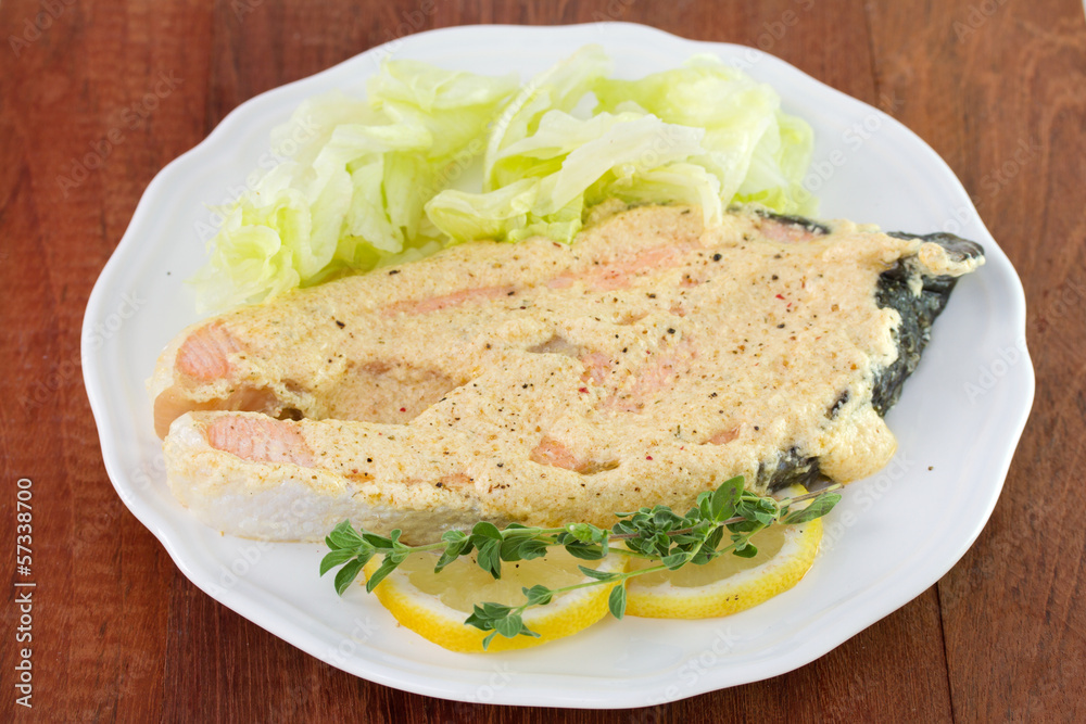 salmon with sauce and lettuce salmon with sauce and lettuce