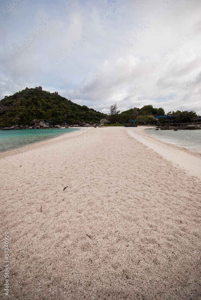 Sandy beach, mountains and the sky Sandy beach, mountains and the sky