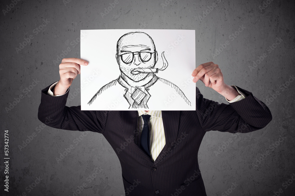 Businessman holding a cardboard with a smoking man on it in fron Businessman holding a cardboard with a smoking man on it in fron