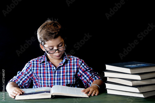 young student reading a book