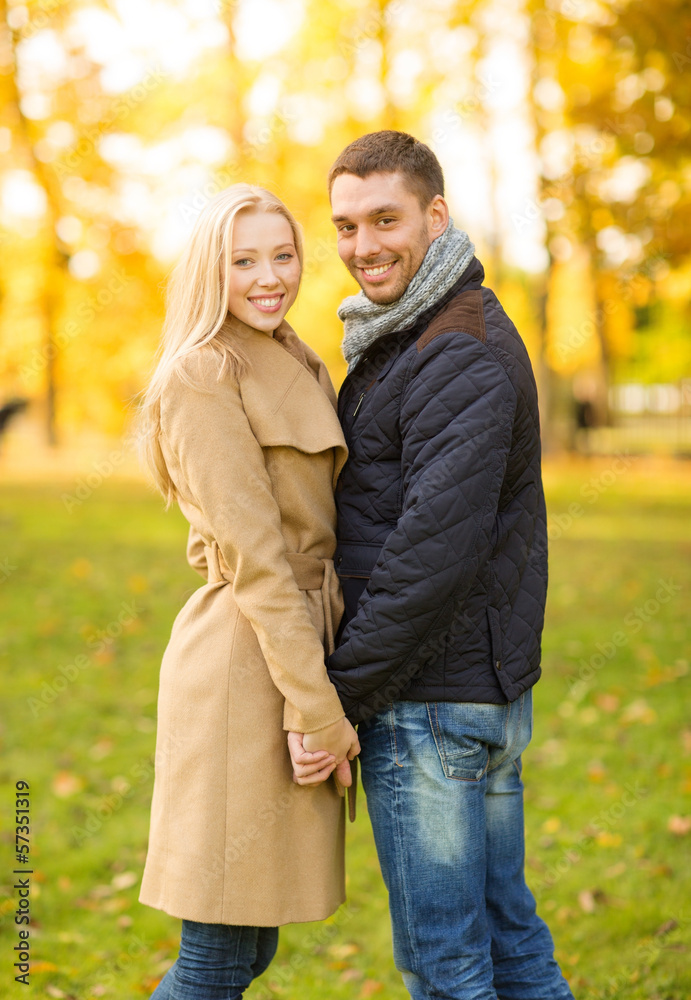 romantic couple in the autumn park romantic couple in the autumn park