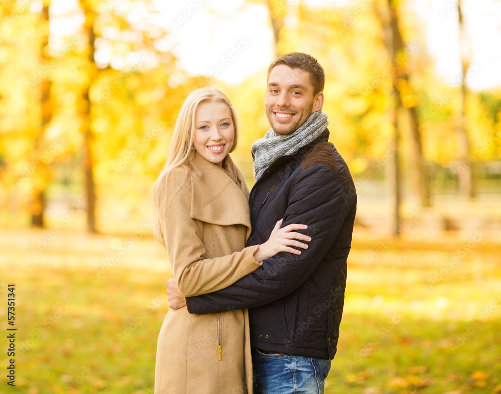 romantic couple in the autumn park romantic couple in the autumn park