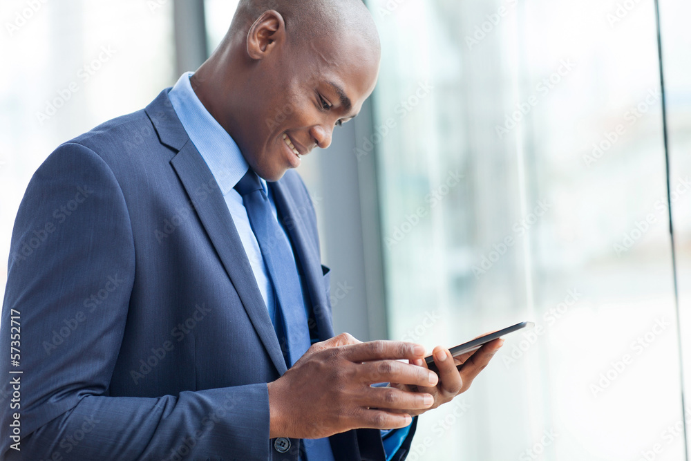 african american entrepreneur using tablet computer african american entrepreneur using tablet computer