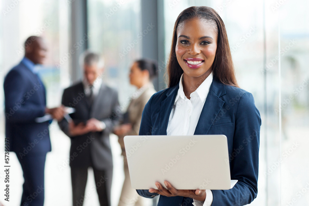 young african american businesswoman using laptop computer young african american businesswoman using laptop computer