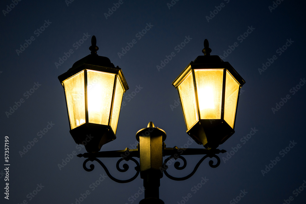 Street lamp post at night time.