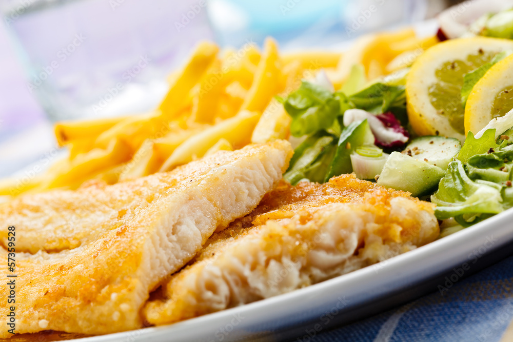 Fish dish - fried fish fillet and vegetables Fish dish - fried fish fillet and vegetables