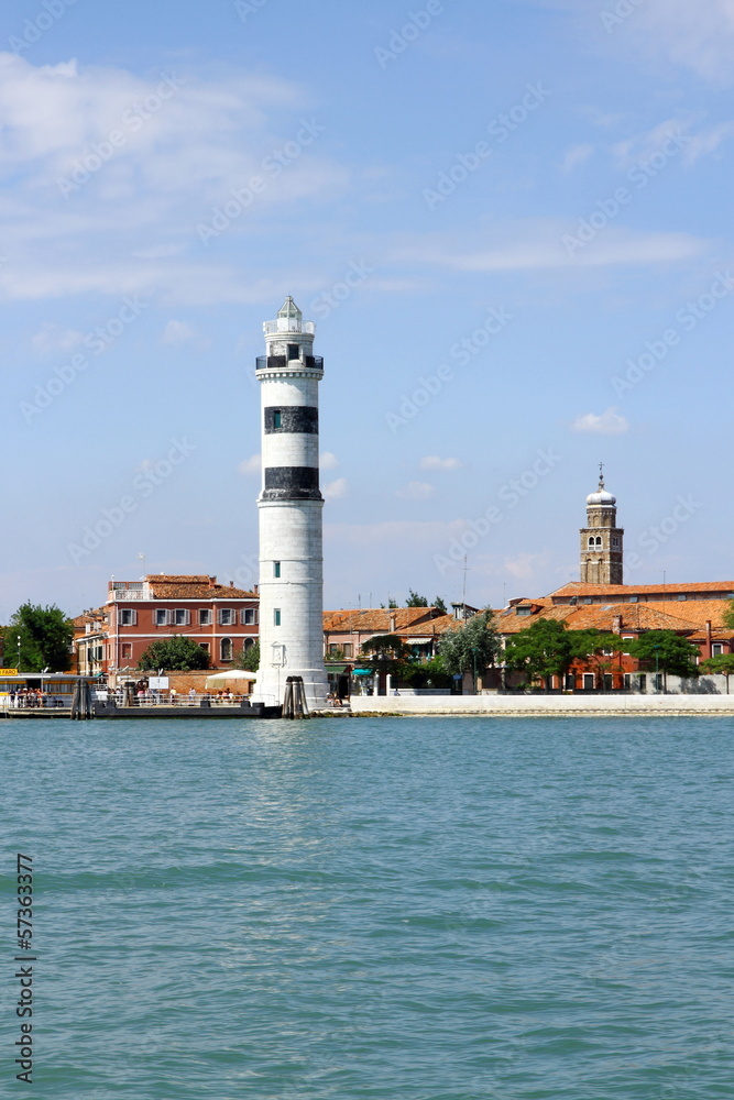 Murano island with lighthouse, view from sea