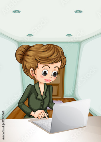 A serious businesswoman using the laptop