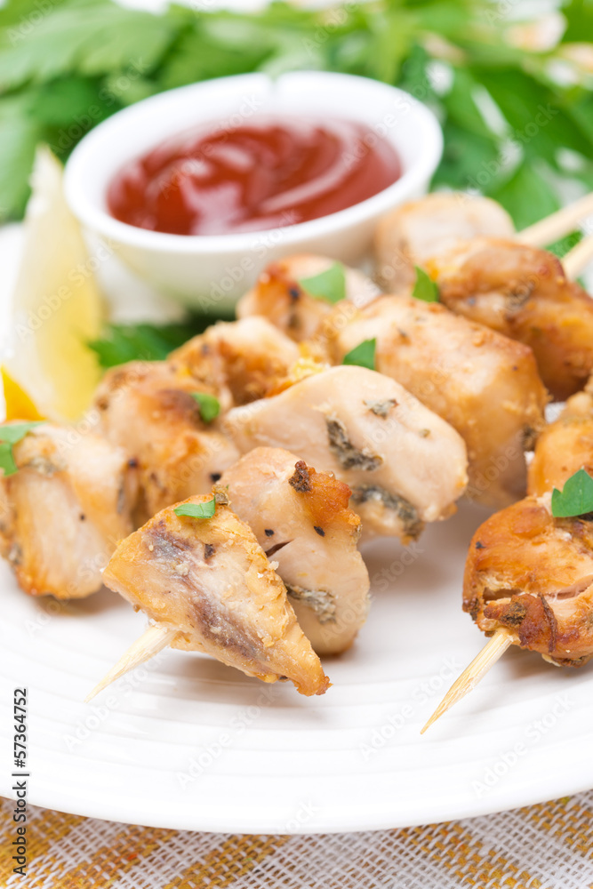 skewers of chicken with lemon, parsley and tomato sauce skewers of chicken with lemon, parsley and tomato sauce